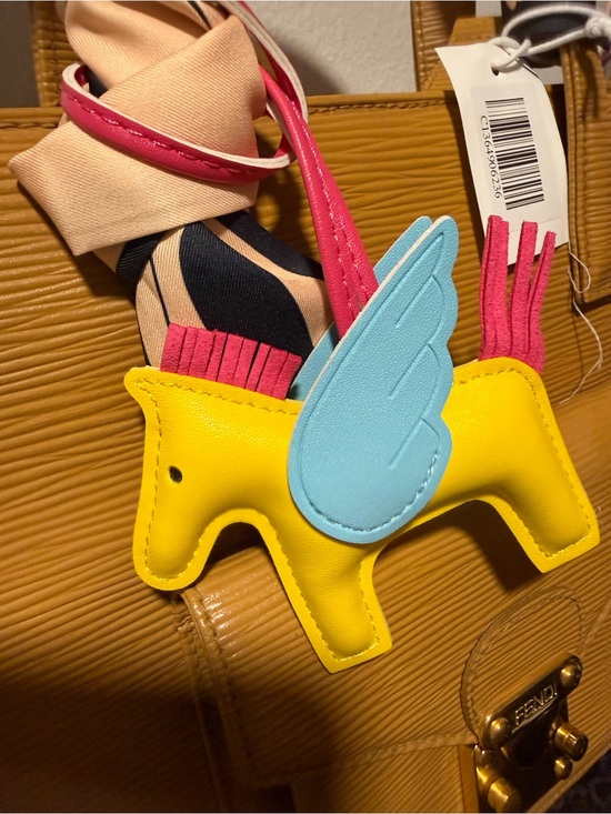 The Unbranded Brand Handbags - Yellow Leather Pony Bag Charm with Blue Wing